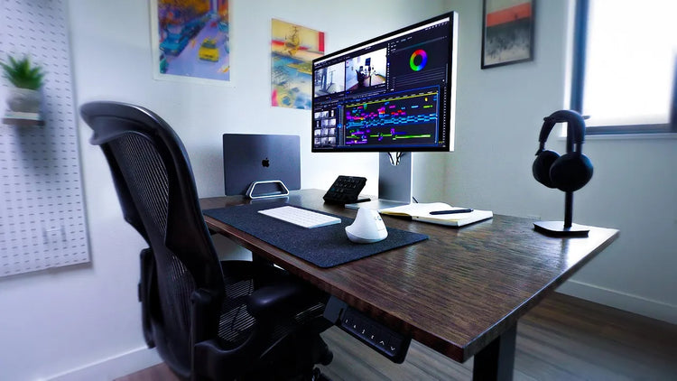 Modern video editing workspace with Ulanzi D200X Creative Deck, dual monitors, and clean desk setup