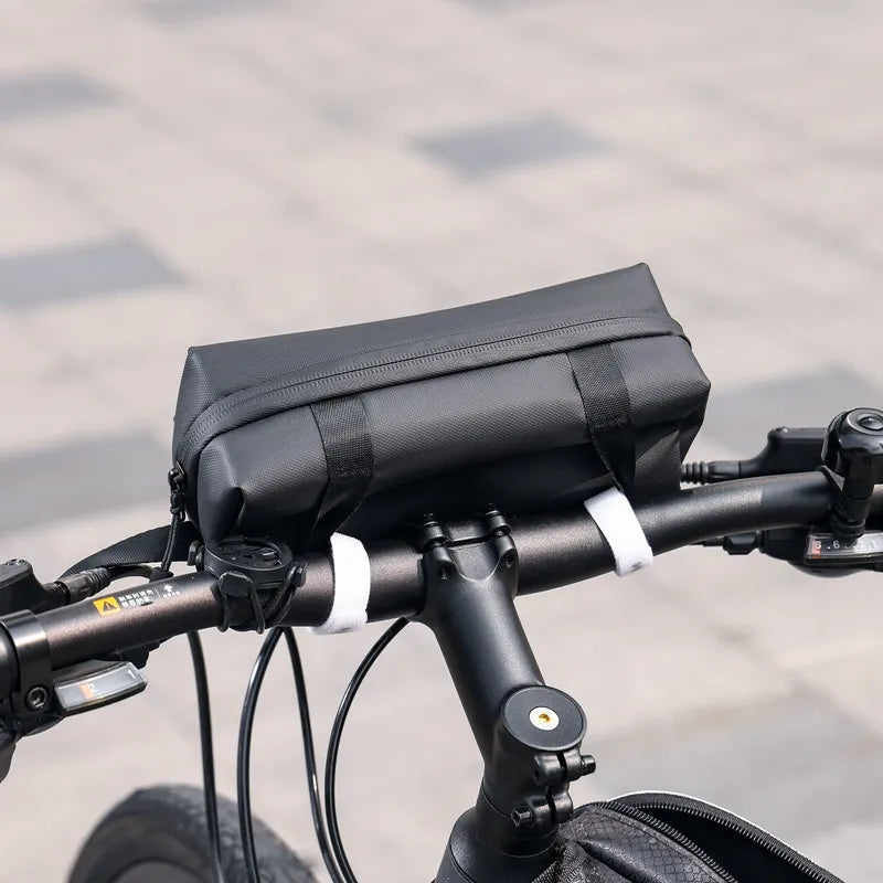 Black Ulanzi bike bag mounted on handlebars, ideal for accessories, compact and durable.