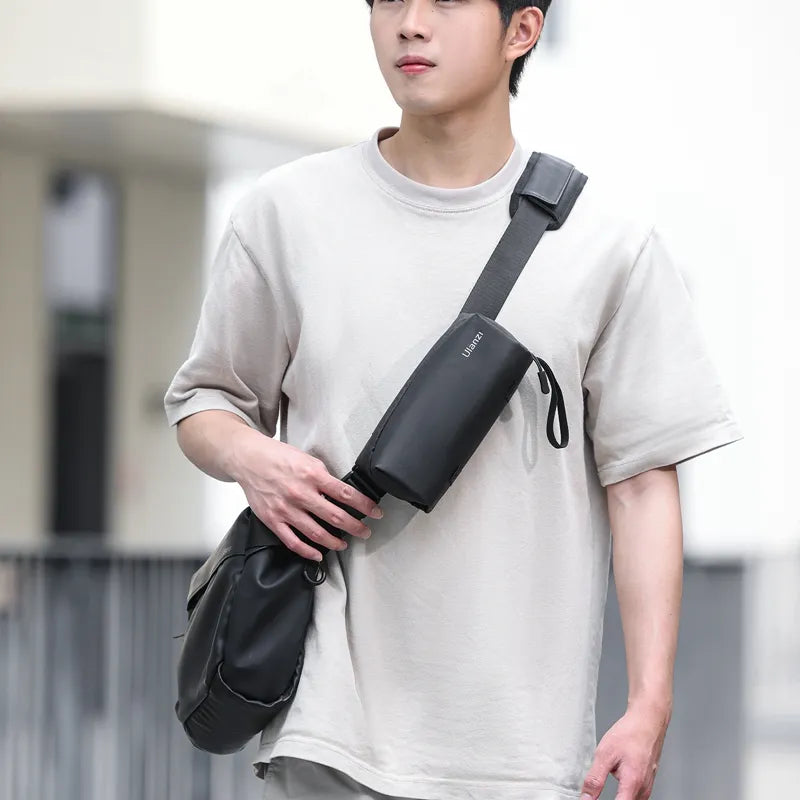 Ulanzi PK-04 carrying bag for DJI Osmo Pocket 3, black sling bag with Ulanzi logo, worn by a man.