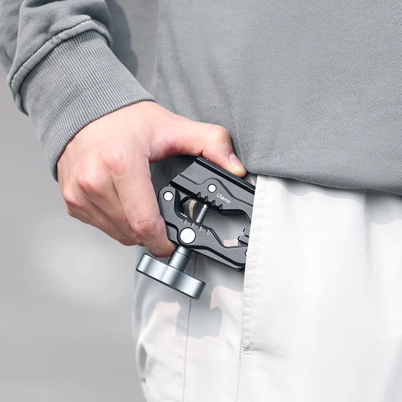 Ulanzi R011a Magic Arm with Crab Clamp T018, black and silver, demonstrating portability in pocket.