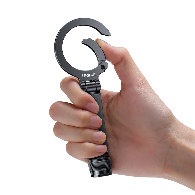 Ulanzi MA07 Maglock phone mount in hand, black design, suitable for smartphone content creation.