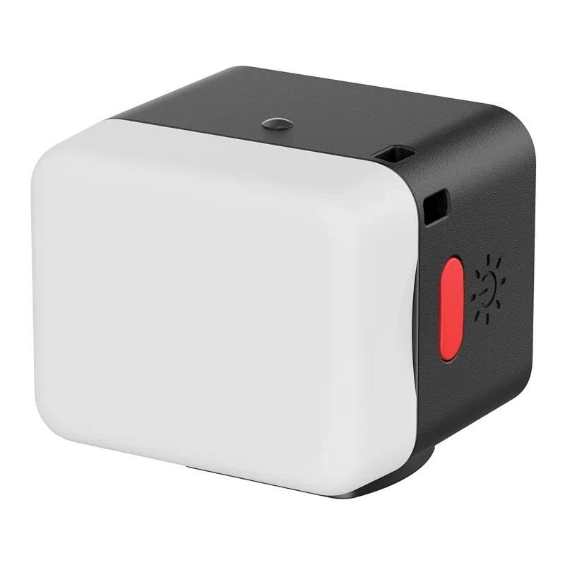 Ulanzi DG01 Cube Light in black and white, with a red button and sun icon, for content creation.