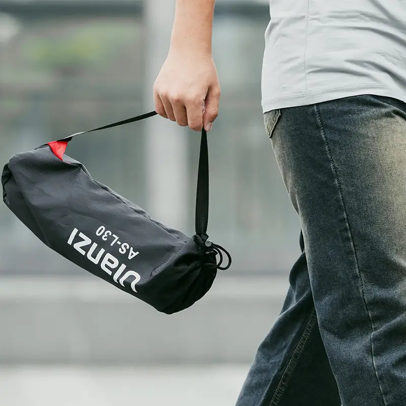 Ulanzi AS-L30 Mini Bowens Mount Lantern Softbox in a carrying bag, portable lighting kit.