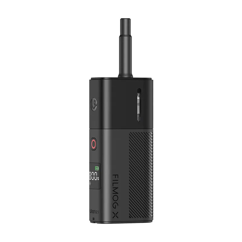 A compact portable fog machine emitting mist, designed for easy handheld use.
