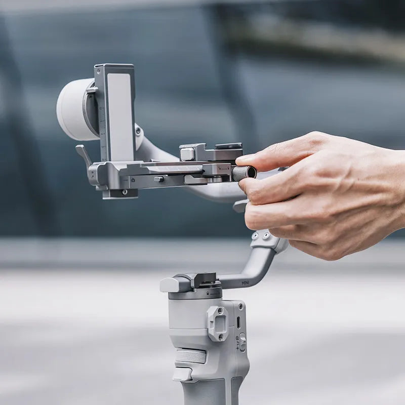 Ulanzi Falcam Quick Release Kit for DJI RS4 Mini - Grey metal quick release system on gimbal.