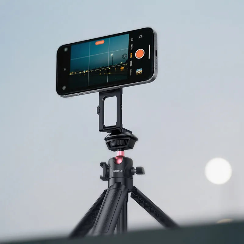 Ulanzi MA50 Uka Magnetic Phone Holder M039 on a tripod, capturing a nighttime landscape.