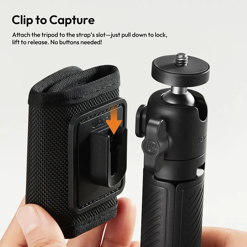 Ulanzi MT88 ClipMate Tripod: Attaching tripod to strap slot, clip-to-capture design, black tripod.