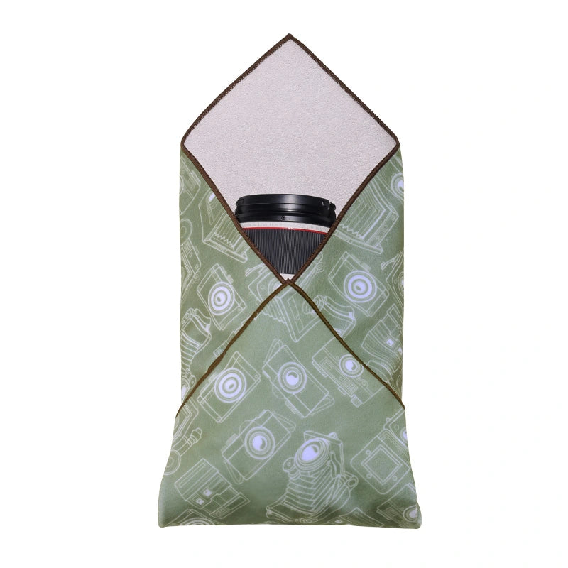 Ulanzi 17-Inch Protective Wrap protecting a camera lens, featuring green wrap with camera pattern.