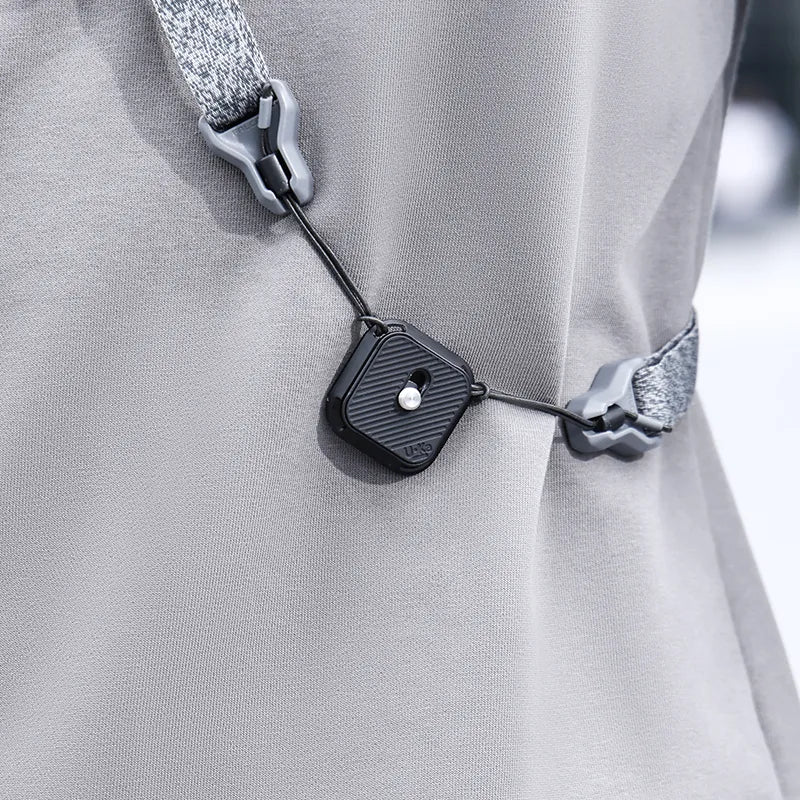 Ulanzi Uka C007 Quick Release Plate, black, attached to strap, for quick setup.