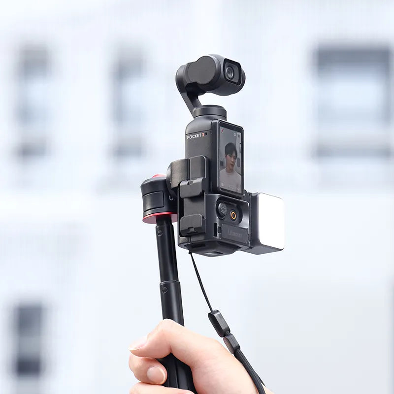 Ulanzi PK-06 Adapter with DJI Osmo Pocket 3, black design, content creation setup with lighting.