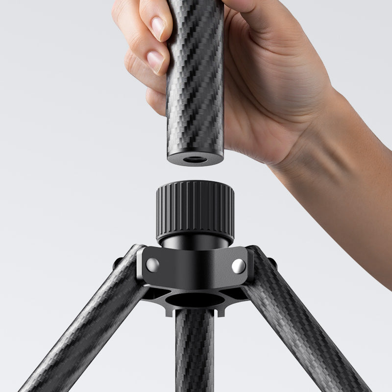 Hand attaching carbon fiber tube to Ulanzi T230 light stand base.