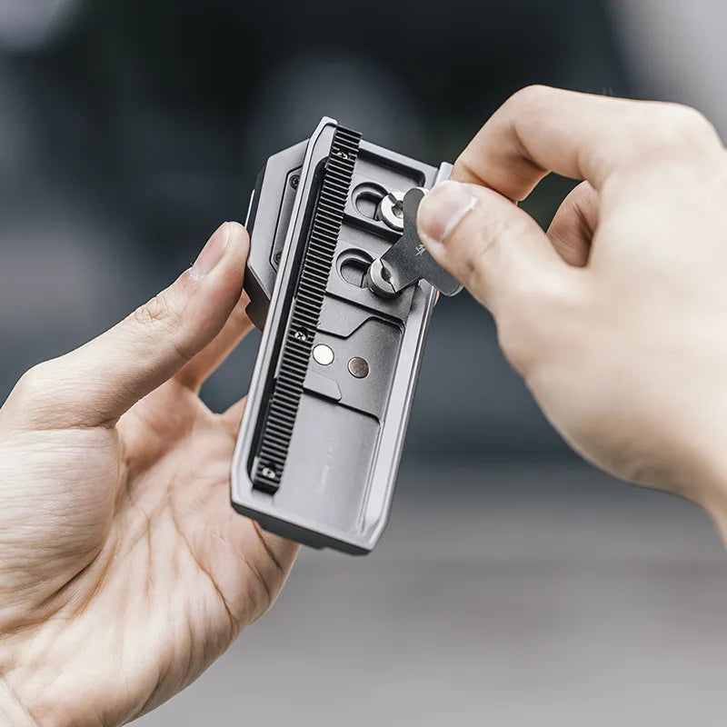 Ulanzi Falcam Quick Release Kit for DJI RS4 Mini - gray metal quick release system with tool.
