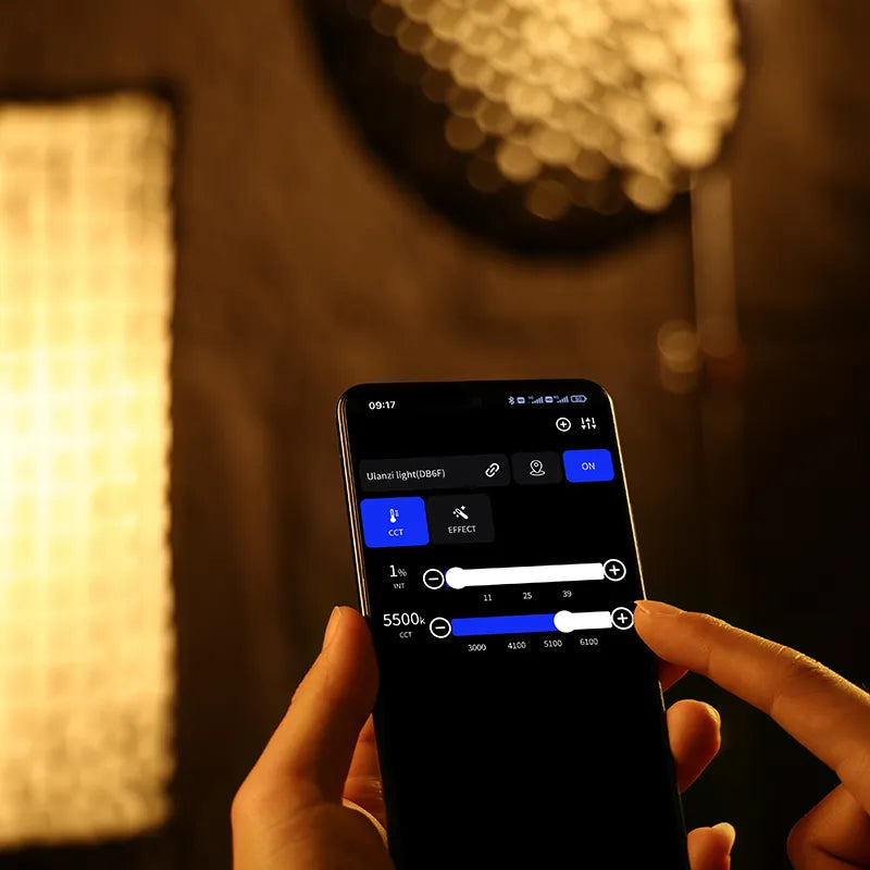 Ulanzi 120W Bi-color video light controlled by smartphone app, adjusting CCT and intensity.