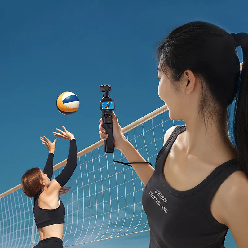 Ulanzi PK-12 Mini Quadpod Battery Handle for Pocket 3 in action, filming a volleyball game.