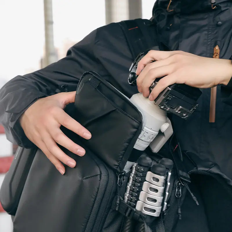 Ulanzi BP10 Hardshell Camera Backpack in use, showing camera gear and organized compartments.