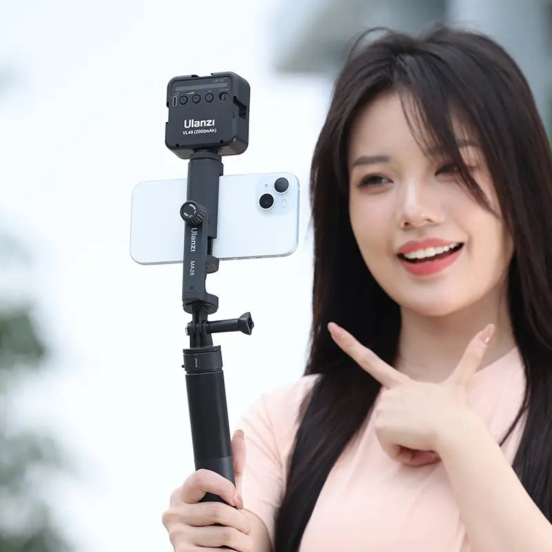 Ulanzi GP Mount Phone Holder M027GBB1 with woman, light and phone.