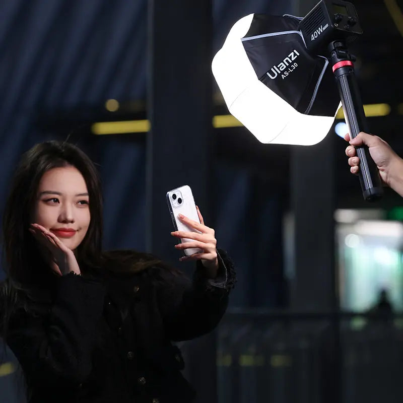 Ulanzi AS-L30 Mini Bowens Mount Lantern Softbox in use, lighting a selfie, 40W light.