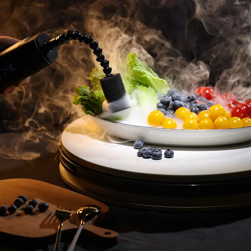 Ulanzi FM01 FILMOG Ace Portable Fog Machine creating a smoky backdrop for a food photography setup.