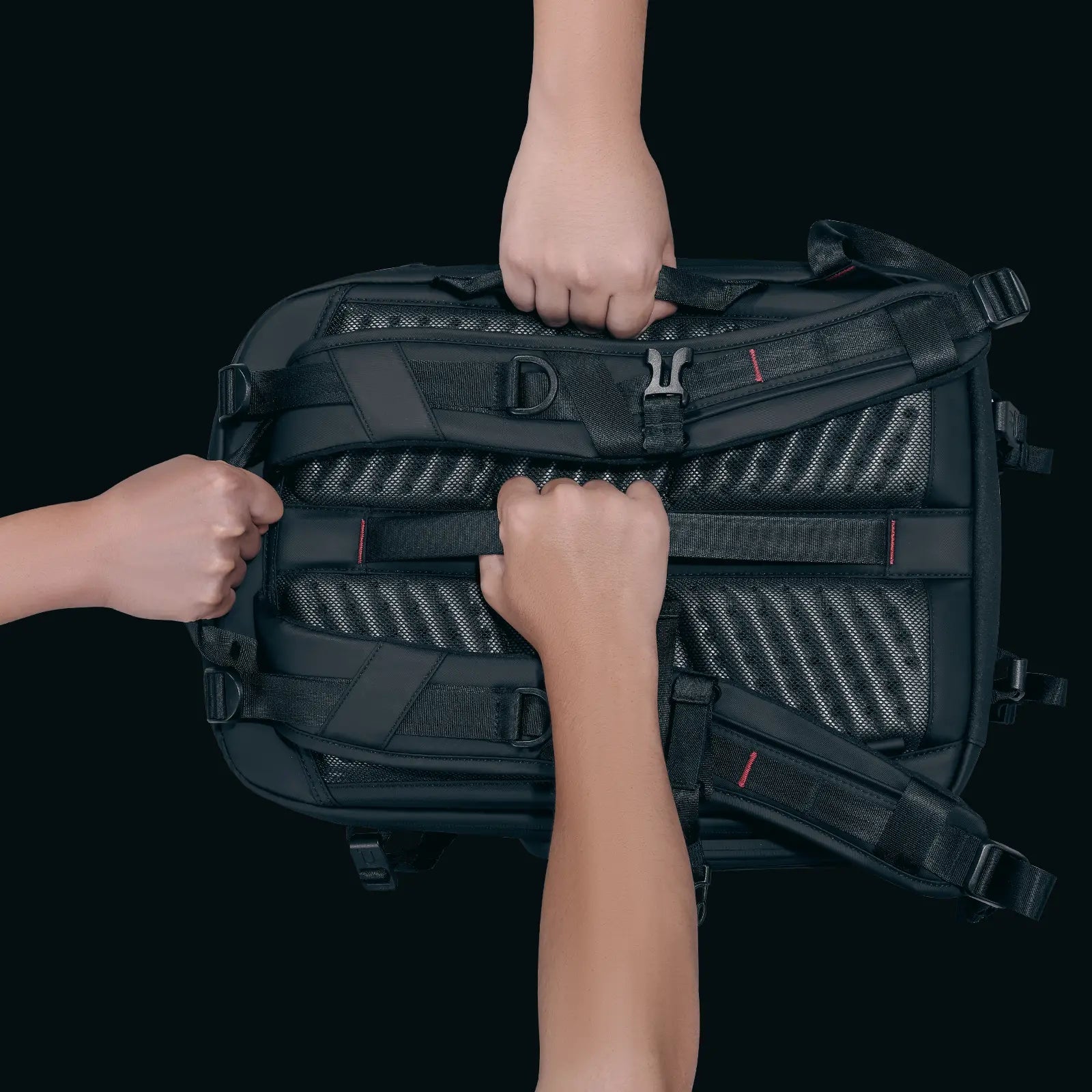 Ulanzi BP09 Camera Backpack held by hands, showing straps and mesh back panel for comfort.