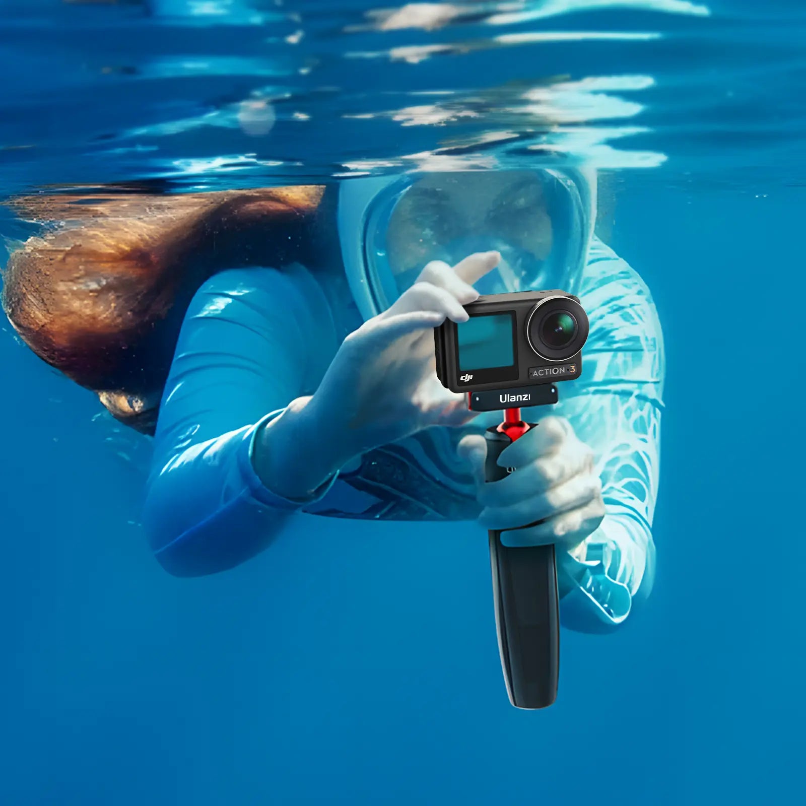 Ulanzi tripod with DJI Action 3 underwater, black and red design, ready for underwater recording.