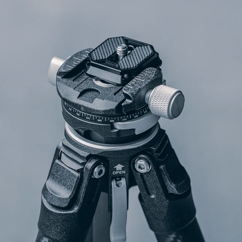 Falcam F38 Tripod Head: Gray aluminum quick release top plate with OPEN indicator.