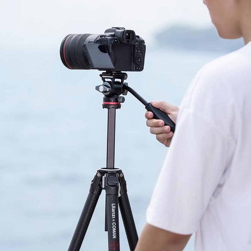 Ulanzi Zero F38 Quick Release Travel Tripod with camera, carbon fiber construction.