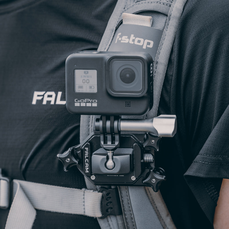Falcam quick release ball head mount for GoPro action camera on backpack, grey and black.
