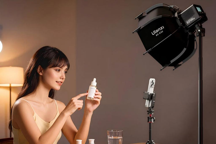 A woman demonstrating a skincare product under professional video lighting.
