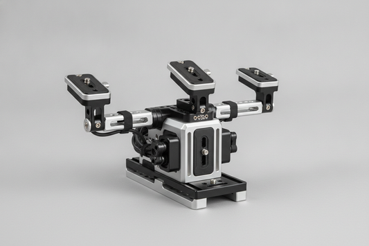 Modular camera mounting system with quick-release plates and accessory arms on a compact rig