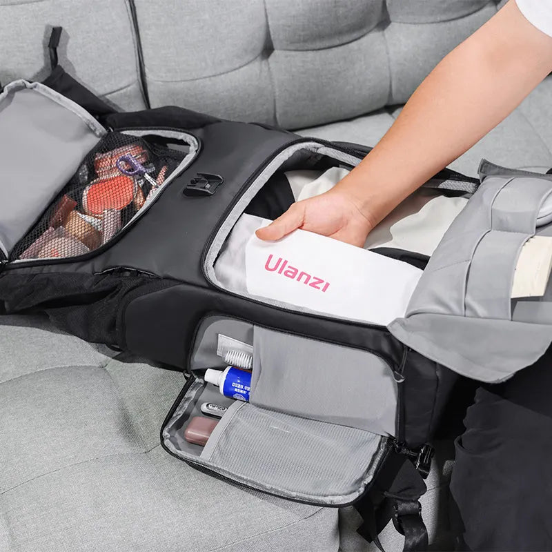 Ulanzi BT01 backpack being opened with organized compartments for travel gear
