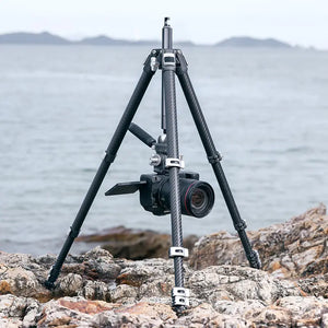 Ulanzi TT09 Carbon Fiber Travel Tripod with Camera on Rocky Beach, travel video shooting.
