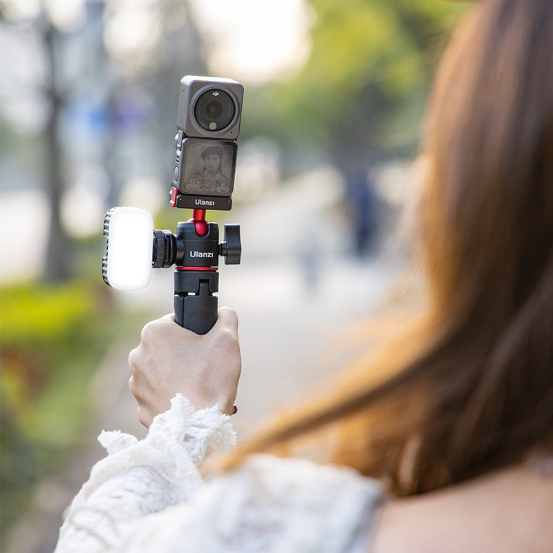 Ulanzi U-180 Magnetic Ball Head with DJI Action Camera setup with light, red and black design.