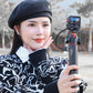 Woman with Ulanzi U-180 Magnetic Ball Head for DJI Action camera, black and red tripod.