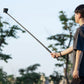 Ulanzi selfie stick pole extended for high angle outdoor photography.