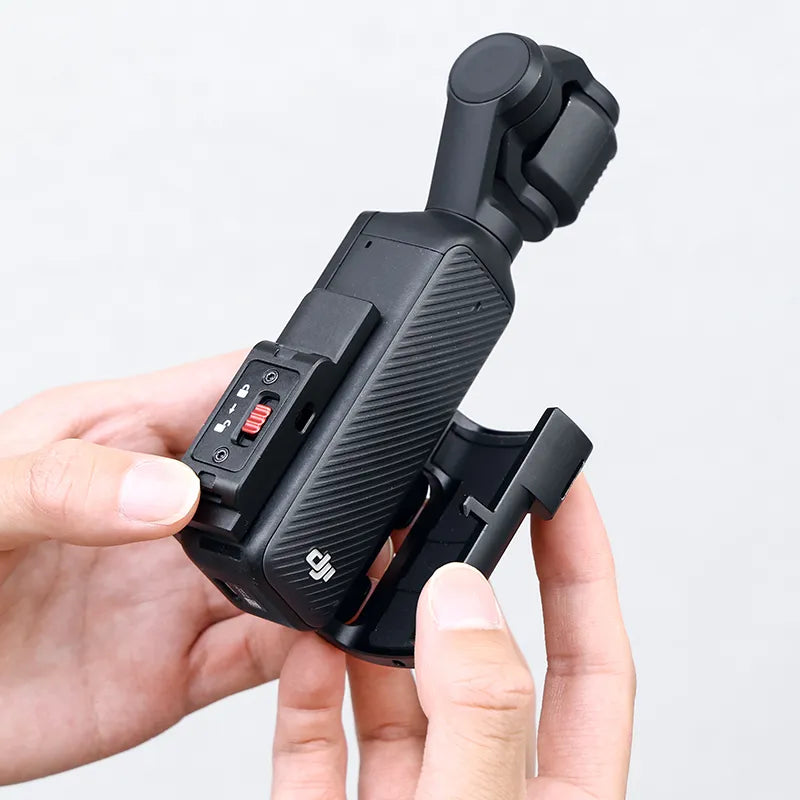User holding Ulanzi PK-06 adapter connected to DJI Osmo Pocket 3, highlighting USB-C port.