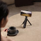 Ulanzi SK-20 tripod holding phone on table.