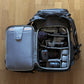 Fully-packed Ulanzi backpack revealing organized camera gear with Canon equipment and custom compartments.