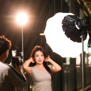 Ulanzi 120W Bi-color video light and LC-D65 softbox setup, for professional video and photography.