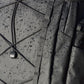 Water-resistant Ulanzi backpack with raindrops and bungee cord design.
