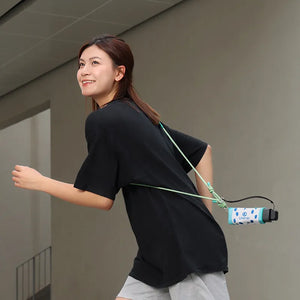 Ulanzi Camera Protective Wrap for Pocket 3, worn while running; green strap and woman.