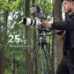 User using Ulanzi VideoFast tripod in a forest with 10kg load capacity