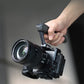 Falcam F22/F38 quick release cage mounted on Sony FX3, held with top handle.