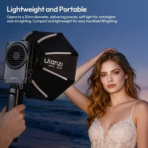 Ulanzi 30cm octagonal softbox handheld beside a portrait model at the beach during a photo shoot