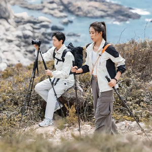 Ulanzi TT35 Hiking Stick Tripod Kit: Photographer using tripod, hiker with hiking stick outdoors.