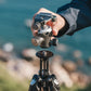 Adjustable tripod ball head in use for precise camera positioning