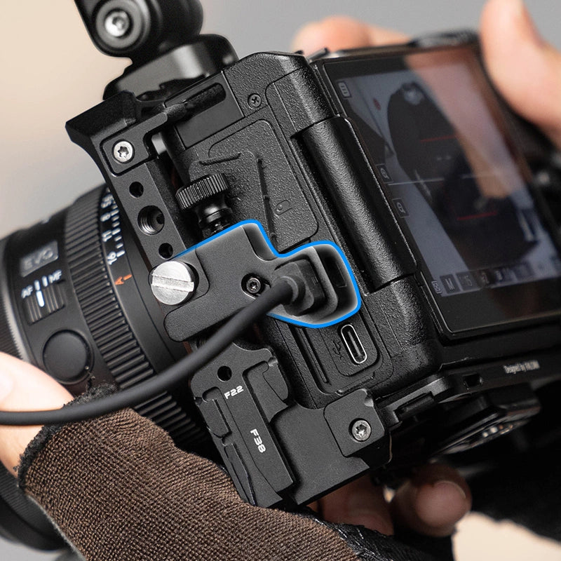 FALCAM F22 & F38 quick release camera cage attached to Nikon ZR camera, showing USB-C connection.