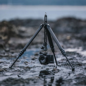 Ulanzi travel tripod with a mounted camera on rocky ground