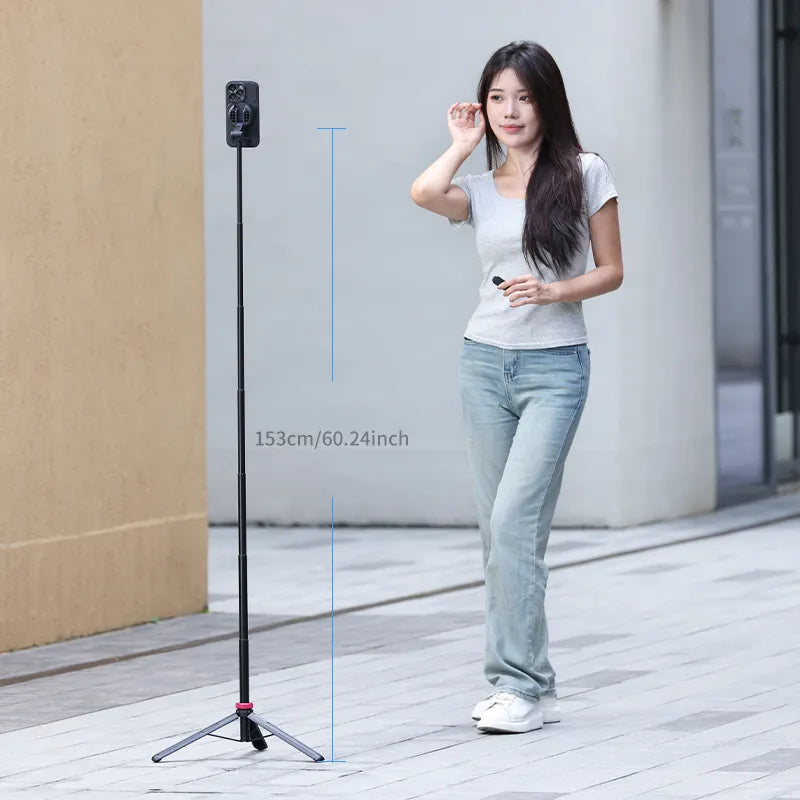 Ulanzi MT-84 Magnetic Tripod shown with a model demonstrating its height and use.