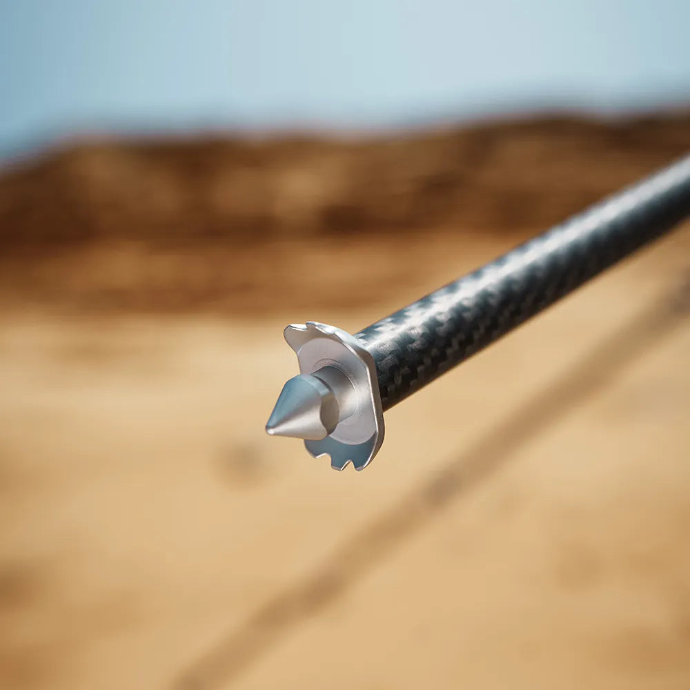 Close-up of TreeRoot Quick Lock Lite Tripod carbon fiber leg tip.