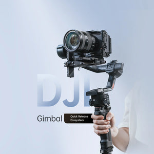 Ulanzi FALCAM F38 Quick Release Base V2 with DJI RS gimbal and camera setup held by hand.